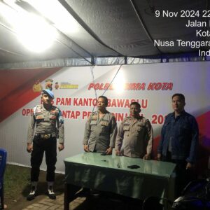 Personel OMP Rinjani 2024 Polres Bima Kota Intensifkan Pengamanan di Kantor KPU dan Bawaslu Kota Bima