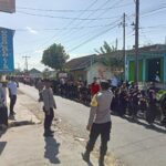 Sinergi TNI-Polri dan BKD Amankan Gerak Jalan HUT RI ke-80 di Desa Jelantik ‎
