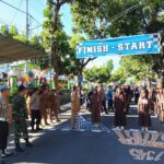 Personel Polsek Bayan Laksanakan Pengamanan Gerak Jalan Tingkat SMP se-Kecamatan Bayan