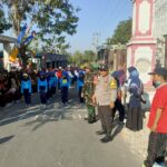 Polsek Pringgarata Amankan Karnaval HUT RI ke-80. ‎