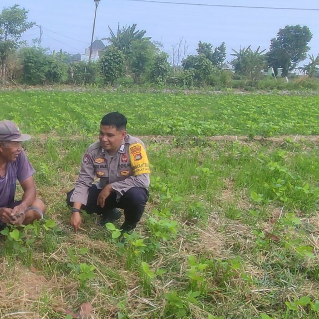 Bhabinkamtibmas Desa Kuranji Ajak Warga Manfaatkan Lahan Kosong untuk Ketahanan Pangan