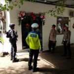 Polsek Maluk Monitoring dan Amankan Ibadah Jemaat Nasrani Katholik
